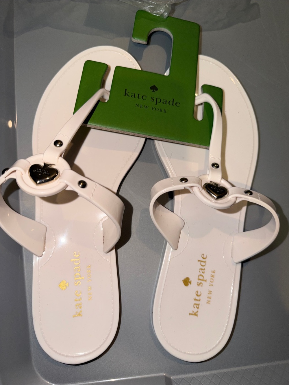 kate spade White Jelly Heart Thong Sandals with Gold Logo